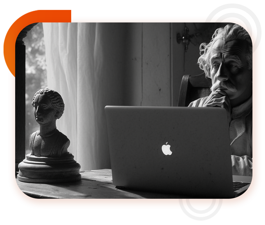 Albert Einstein sitzt vor modernem Laptop